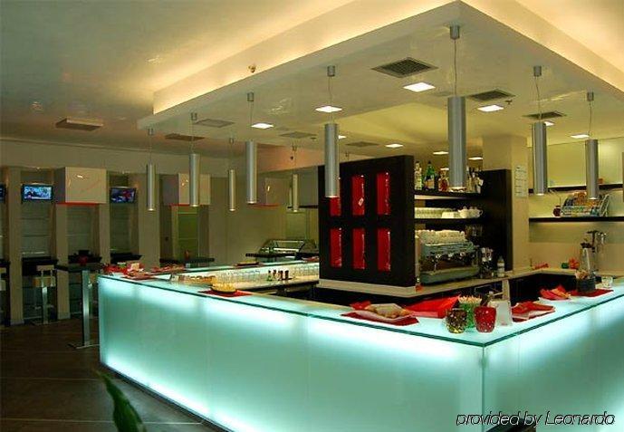 คอร์ตยาร์ด เวนิส แอร์พอร์ต Hotel เตสเซรา ร้านอาหาร รูปภาพ